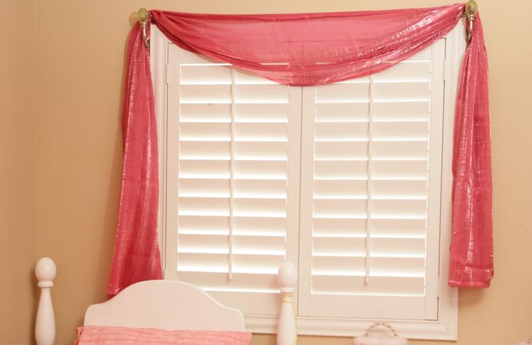 Child's bedroom with plantation shutters.